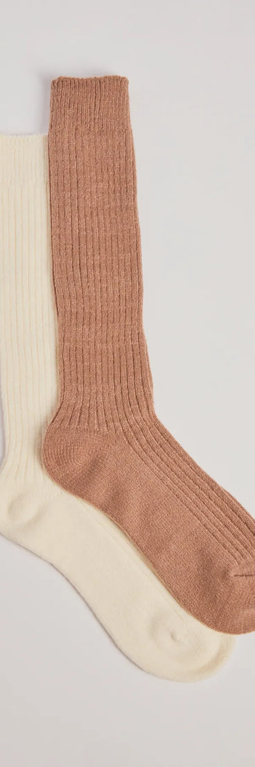 Add a touch of seasonal charm to your winter wardrobe with the Cozy Moments Two-Pack Slouch Socks, a multi-color cold-weather accessory that effortlessly completes your seasonal looks!