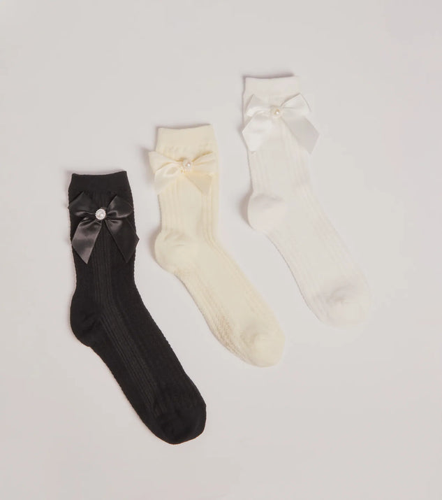 Add a touch of seasonal charm to your winter wardrobe with the Cozy Glam Bow And Faux Pearl Multi-Sock Pack, a multi-color cold-weather accessory that effortlessly completes your seasonal looks!