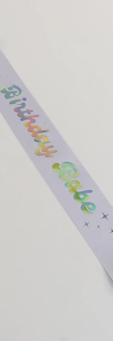 Style your vibe in seconds with the Birthday Babe Metallic Satin Sash in lavender, a fashion accessories essential that completes any outfit with ease.