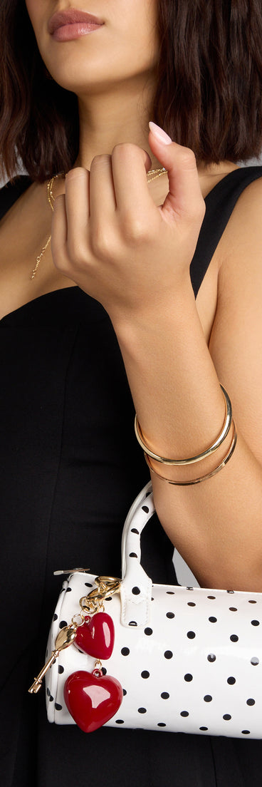 Style your vibe in seconds with the Heartbreaker Key To My Bag Charm, a fashion accessories essential that completes any outfit with ease.