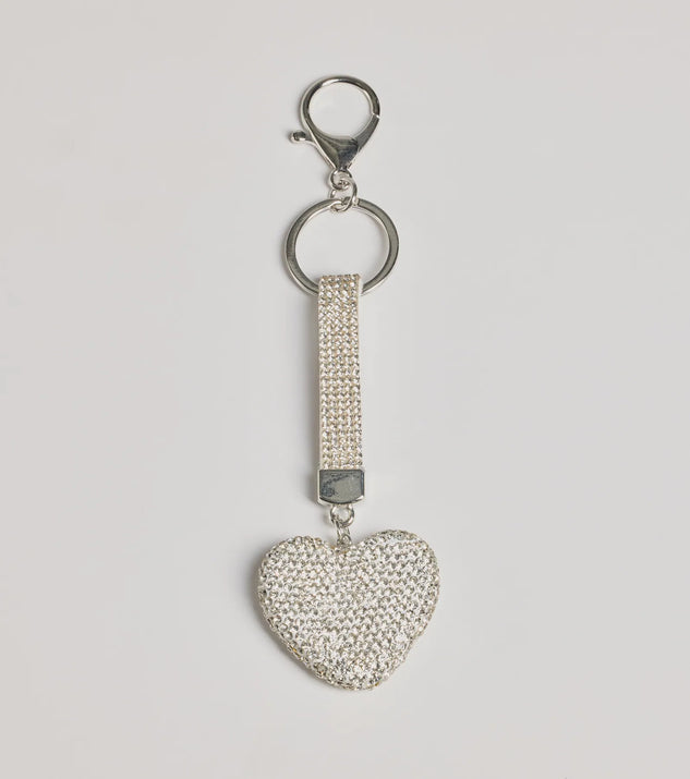 
Upgrade your style game for 2025 with the Shimmering Rhinestone Heart Bag Charm in silver, perfect for any fashion-forward wardrobe.