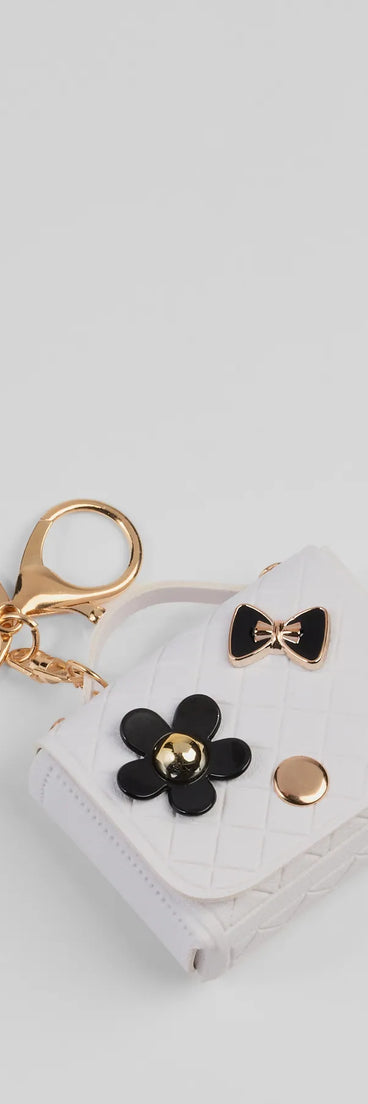 Get inspired with the Flower Bow Mini Purse Keychain, a feed-worthy white piece that’s part of Windsor's updated and curated women’s clothing edit packed with must-have fall outfit ideas.