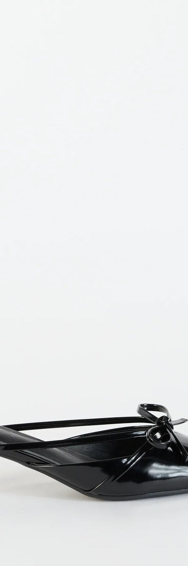 Turn heads in the Sweetest Thing Bow Kitten Heel Mules, black heels showcasing a fresh trend or stylish detail made to elevate your full Windsor fit.