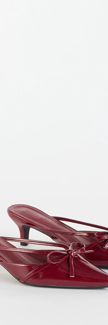 Step into style with the Sweetest Thing Bow Kitten Heel Mules, burgundy heels made to complete your Windsor look with comfort and glam in mind.