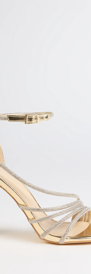 Elevate warm-weather looks with Radiant Night Rhinestone Metallic Stiletto Heels in gold, a pair of trendy sandals bringing chic, modern flair to every step.