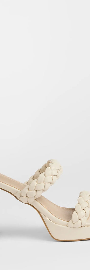 Elevate warm-weather looks with Social Season Braided Strap Mules in ivory, a pair of trendy sandals bringing chic, modern flair to every step.