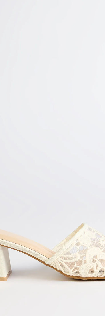 Elevate warm-weather looks with Flirty And Fun Lace Block Heel Mules in ivory, a pair of trendy sandals bringing chic, modern flair to every step.