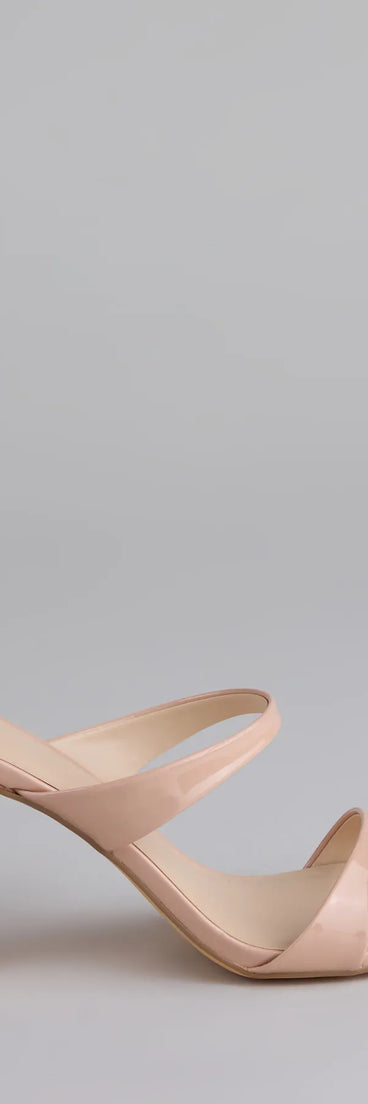 Elevate warm-weather looks with Chic Strut Strappy Block Heel Mules in nude, a pair of trendy sandals bringing chic, modern flair to every step.
