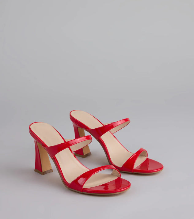 Elevate warm-weather looks with Chic Strut Strappy Block Heel Mules in red, a pair of trendy sandals bringing chic, modern flair to every step.