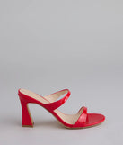 Elevate warm-weather looks with Chic Strut Strappy Block Heel Mules in red, a pair of trendy sandals bringing chic, modern flair to every step.