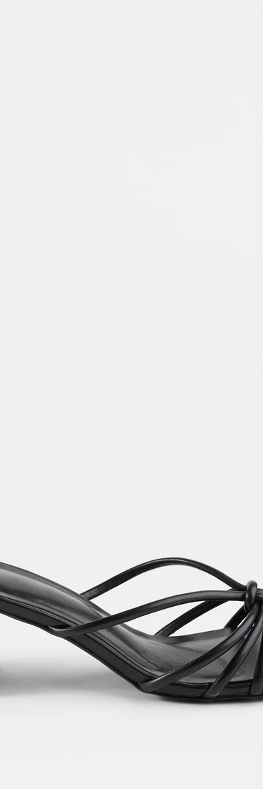 Turn heads in the Sleek Staple Strappy Square Toe Mules, black heels showcasing a fresh trend or stylish detail made to elevate your full Windsor fit.