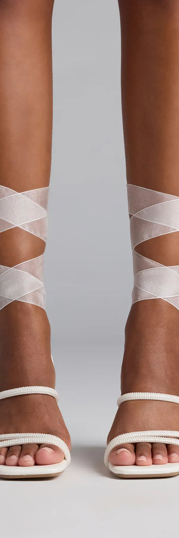 Turn heads in the Stay Elegant Lace-Up Rhinestone Block Heels, white heels showcasing a fresh trend or stylish detail made to elevate your full Windsor fit.