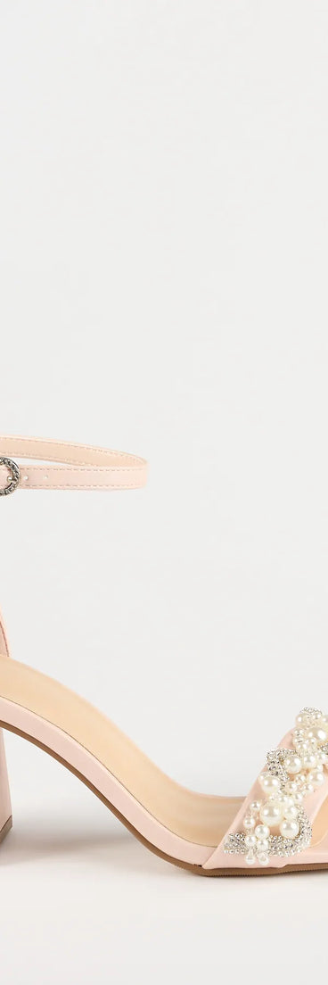 Elevate warm-weather looks with Chic Stride Rhinestone And Pearl Block Heels in pink, a pair of trendy sandals bringing chic, modern flair to every step.