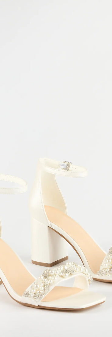 Step into style with the Chic Stride Rhinestone And Pearl Block Heels, white heels made to complete your Windsor look with comfort and glam in mind.