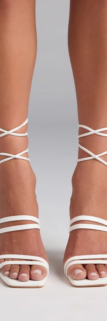 Elevate warm-weather looks with Major Moment Lace-Up Stiletto Heels in white, a pair of trendy sandals bringing chic, modern flair to every step.
