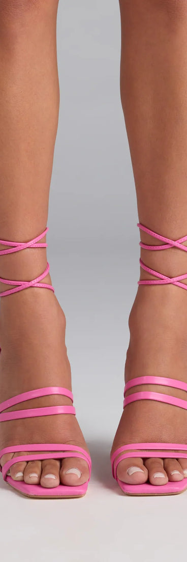Elevate warm-weather looks with Major Moment Lace-Up Stiletto Heels in pink, a pair of trendy sandals bringing chic, modern flair to every step.