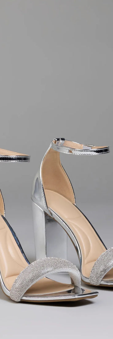 Step into style with the Bling On The Sparkle Rhinestone Metallic Block Heels, silver heels made to complete your Windsor look with comfort and glam in mind.