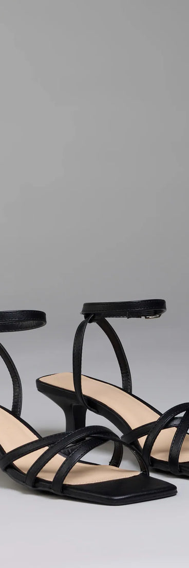 Step into style with the Chic And Ready Strappy Kitten Heels, black heels made to complete your Windsor look with comfort and glam in mind.