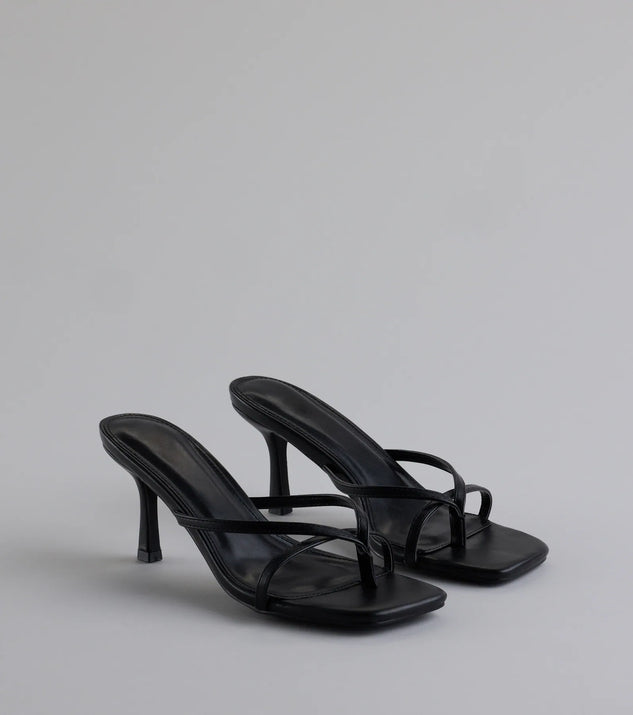 Step into style with the Out And About Strappy Thong Stiletto Mules, black heels made to complete your Windsor look with comfort and glam in mind.