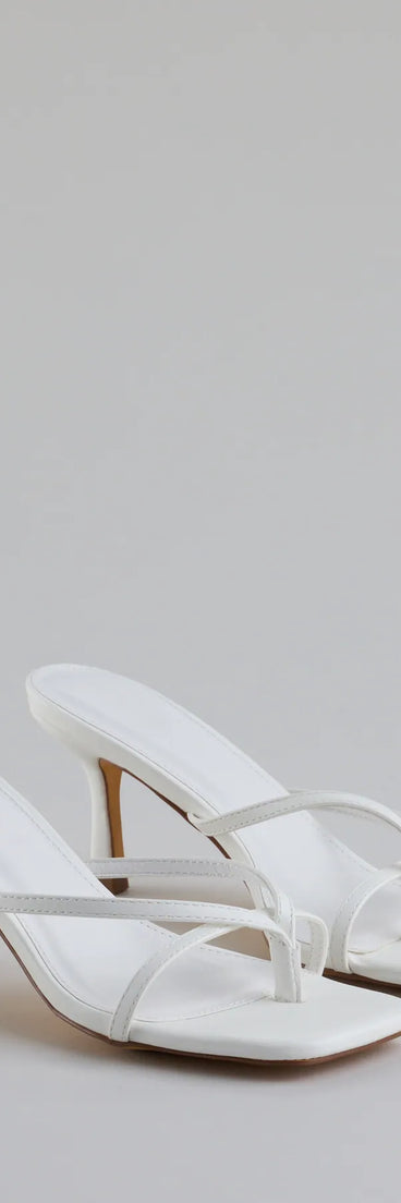 Step into style with the Out And About Strappy Thong Stiletto Mules, white heels made to complete your Windsor look with comfort and glam in mind.