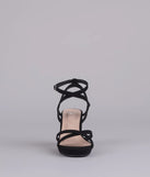 Elevate warm-weather looks with RSVP Yes Strappy Platform Block Heels in black, a pair of trendy sandals bringing chic, modern flair to every step.