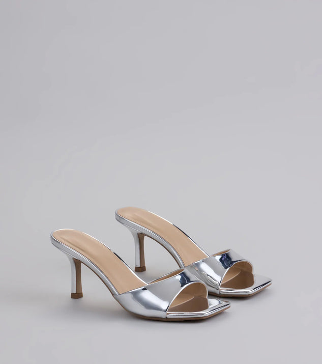 Step into style with the Glam Stunner Stiletto Mules, silver heels made to complete your Windsor look with comfort and glam in mind.