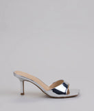 Turn heads in the Glam Stunner Stiletto Mules, silver heels showcasing a fresh trend or stylish detail made to elevate your full Windsor fit.