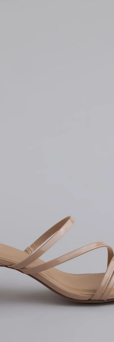 Elevate warm-weather looks with Cute Attitude Strappy Kitten Heel Mules in nude, a pair of trendy sandals bringing chic, modern flair to every step.