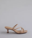 Elevate warm-weather looks with Cute Attitude Strappy Kitten Heel Mules in nude, a pair of trendy sandals bringing chic, modern flair to every step.