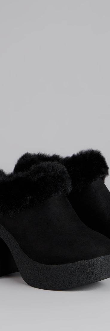 This black piece brings trend-right energy to the Fuzzy Feel Chunky Clog Mules, perfect for fall outfits that stand out.