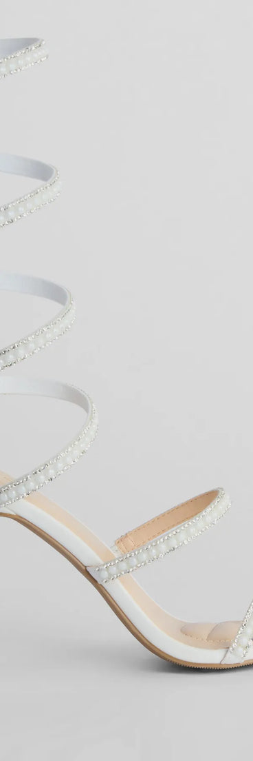 The Endless Luxe Faux Pearl Spiral Stiletto Heels in white brings sleek style to any graduation outfit, from cap and gown to after-party.