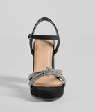 The Fabulous Impression Rhinestone Knot Platform Heels are versatile prom shoes designed for comfort and style, making them perfect for a night of celebration. Available in Black.