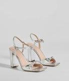 Party Moves Rhinestone Buckle Metallic Block Heels are prom shoes with the perfect balance of style and comfort, ideal for dancing and long evening wear. Available in Silver.