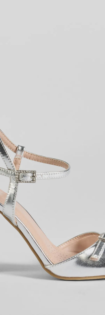 Party Moves Rhinestone Buckle Metallic Block Heels are the perfect prom shoes, featuring a stylish and comfortable design that's ideal for dancing all night. Available in Silver.
