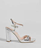 Party Moves Rhinestone Buckle Metallic Block Heels are the perfect prom shoes, featuring a stylish and comfortable design that's ideal for dancing all night. Available in Silver.