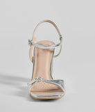 These silver prom shoes, the Party Moves Rhinestone Buckle Metallic Block Heels, combine sleek style and comfort for the perfect night out.