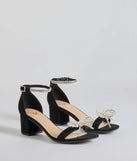 The Dazzling Rhinestone Faux Pearl Bow Block Heels are versatile prom shoes designed for comfort and style, making them perfect for a night of celebration. Available in Black.