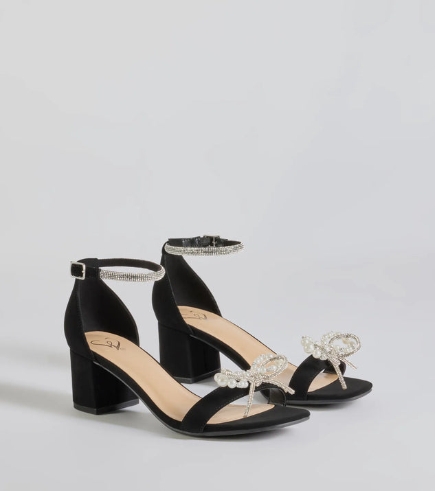 The Dazzling Rhinestone Faux Pearl Bow Block Heels are versatile prom shoes designed for comfort and style, making them perfect for a night of celebration. Available in Black.