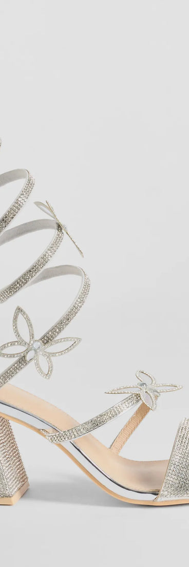 Step out in these Glitzy Rhinestone Butterfly Spiral Strap Block Heels, perfect as homecoming shoes with their elegant style and glittering details to complement any outfit. Available in Silver.