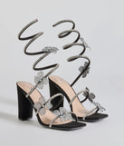 Major Beauty Rhinestone Floral Spiral Block Heels are the perfect prom shoes, featuring a stylish and comfortable design that's ideal for dancing all night. Available in Black.