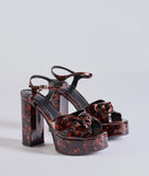 Elevate your work wardrobe with the Chic Impression Tortoise Print Platform Knot Heels in tortoise, a versatile women's shoe perfect for the office; that combines style with comfort for seamless desk-to-dinner transitions.