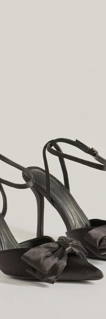 Elegance Elevated Stiletto Bow Heels, a trendy black addition to women's going-out outfits, is ideal for Christmas party outfits, chic NYE attire, or winter night-out looks that keep you on-trend!