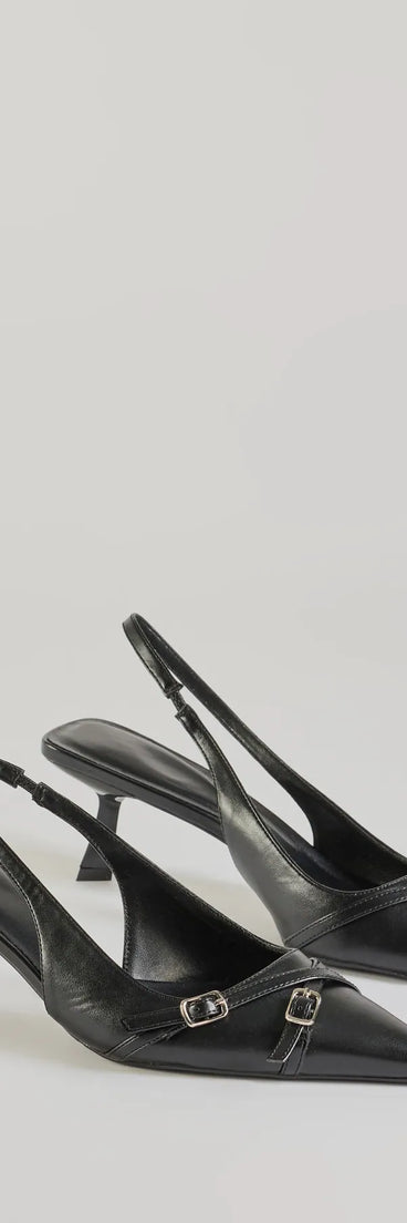 The Raise The Bar Kitten Heel Mules are women's black shoes for work, featuring a sleek silhouette and cushioned sole for all-day comfort, and are a trendy choice for professional or business casual outfits.