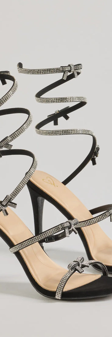 Step into style with the Glam Era Rhinestone Bow Spiral Strap Stiletto Heels, black heels made to complete your Windsor look with comfort and glam in mind.