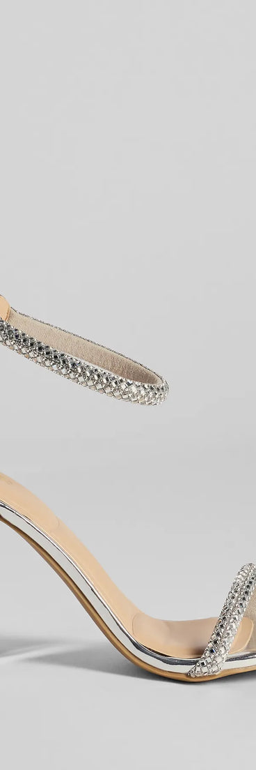 Turn heads in the Glam Moves Rhinestone Strap Block Heels, silver heels showcasing a fresh trend or stylish detail made to elevate your full Windsor fit.