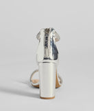 Turn heads in the Glam Moves Rhinestone Strap Block Heels, silver heels showcasing a fresh trend or stylish detail made to elevate your full Windsor fit.