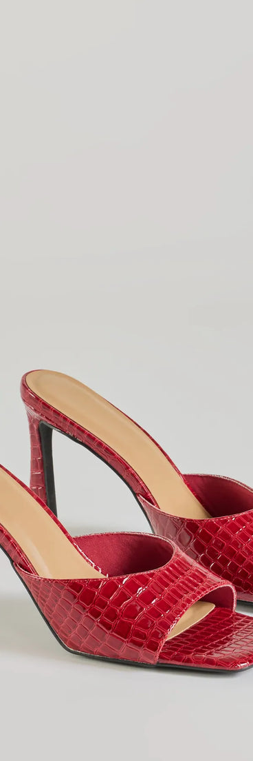Elevate your work wardrobe with the Wildly Sophisticated Faux Croc-Embossed Stiletto Mules in red, a versatile women's shoe perfect for the office; that combines style with comfort for seamless desk-to-dinner transitions.