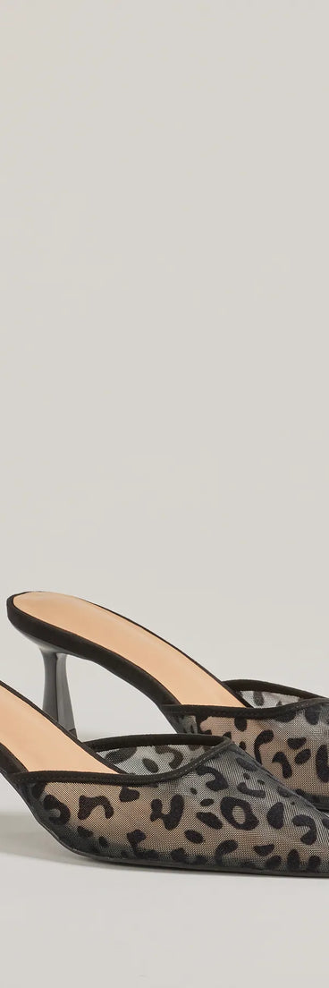 Fierce Moment Leopard Print Kitten Heeled Mules, a trendy black addition to women's going-out outfits, is ideal for Christmas party outfits, chic NYE attire, or winter night-out looks that keep you on-trend!
