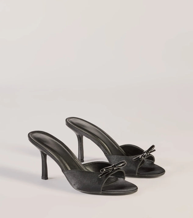 Elevate your work wardrobe with the Chic Elegance Faux Leather Stiletto Bow Mules in black, a versatile women's shoe perfect for the office; that combines style with comfort for seamless desk-to-dinner transitions.