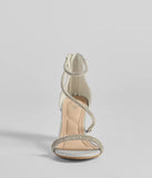 The Reigning In Rhinestone Asymmetrical Strap Glitter Heels in silver brings sleek style to any graduation outfit, from cap and gown to after-party.